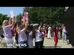 Groups supportive of state bans on transgender athletes gather outside the Supreme Court