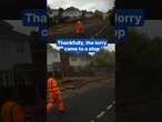 Runaway lorry smashes into brick wall