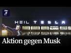 Protest gegen Musk: Aktivisten projizieren „Heil Tesla“ auf Tesla-Fabrik bei Berlin