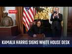 US Vice President Kamala Harris signs her desk in the ceremonial White House office - Watch live