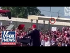 New footage from Trump assassination attempt shows figure moving on roof before gunfire