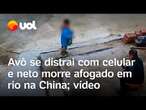 Criança morre afogada em rio após avó se distrair mexendo no celular, na China; vídeo