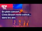 Le chanteur Chris Brown reste coincé dans les airs en plein concert