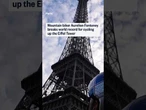 Mountain biker Aurelien Fontenoy breaks world record for cycling up the Eiffel Tower