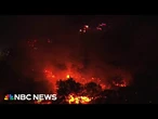 Extreme weather continues across the U.S. with wildfires, torrential rain and record heat