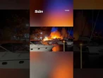 Shocking moment huge fire and ‘multiple explosions’ erupt at popular marina before two boats sink