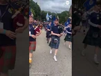 Duck wearing Scottish flag leads march through Rhode Island