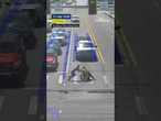 Driver dressed as Spider-Man helps man in wheelchair cross road
