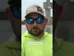 Two dead after chopper hits power line and crashes over Mississippi River