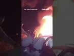 Officers smash windows and pull a trapped driver from a burning car #shorts #viral #news #new #usa