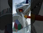 ‘STOP THE SLIDE!’: Passengers on world's largest cruise ship panic as slide panel shatters