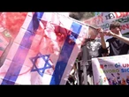 PRIMO MAGGIO a TORINO, gli antagonisti bruciano le bandiere di USA, ISRAELE e UE al corteo