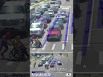 Spider-man helps man in wheelchair cross the street