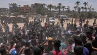 Photos show Palestinians pursuing food aid after the latest air drops in Gaza