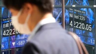 World shares sink after Trump escalates feud with the Federal Reserve