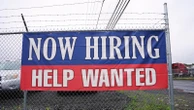 US applications for jobless aid fell to 233,000 last week as layoffs remain low