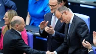 German chancellor to visit Warsaw and Paris to stress European unity