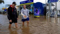 Record floodwaters in eastern Australia leave 2 dead and 2 missing