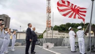Australia's defense minister visits a frigate in Japan as the countries boost defense ties
