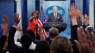 Biden takes a victory lap on economy in surprise visit to White House briefing room