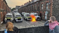 Police use water cannon amid anti-immigrant violence in Northern Ireland town