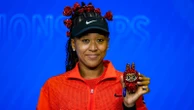 Naomi Osaka reveals her special accessory at the US OpenThe four-time Grand Slam champion sported an all-red outfit with roses.August 27, 2025