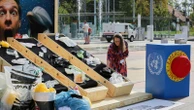 Soap, wristbands and scaling the UN: People get creative during final plastic pollution treaty talks