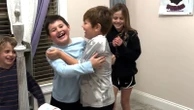 Boy tears up after surprise visit from best friend