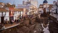 Crashing waves in a hilltop village, a night of terror from Spain's floods