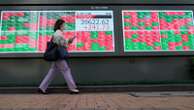 Asian stocks mixed as markets wait for China policy briefing