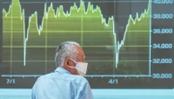 Asian shares are mostly higher, tracking US rally into record heights