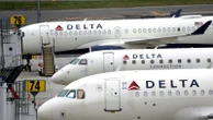 Why did it take days for Delta to restore normal service after outage?