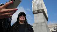 Faces of transgender people adorn an artwork in London's Trafalgar Square