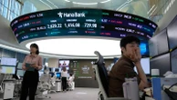 Asian shares mostly gain amid cautious relief over U.S.-China agreement