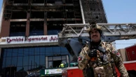 Officials try to identify 18 bodies in deadly Iraq shopping mall fire