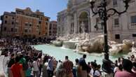 Rome considers imposing a fee to discourage crowds and plunges at Trevi Fountain