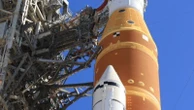 NASA will return its moon rocket to the hangar for more repairs before astronauts strap in