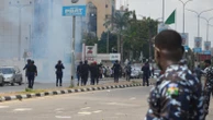 Nigeria's president replaces top security officials as he struggles to restore stability