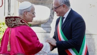 Pope Leo XIV declares 'I am Roman!' as he completes process to be bishop of Rome