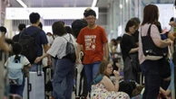 Heavy rains in Japan cause flooding and mudslides, and leave several people missing