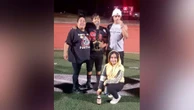 Mom dies after collapsing at son's football game