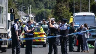 UK police quiz teenage suspect over attack that left 2 children dead and several critically hurt