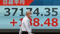 World stocks are mixed and oil prices slip after Treasury yields ease