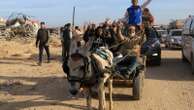 Palestinians trek across rubble to return to their homes as Gaza ceasefire takes hold