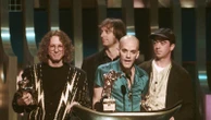 Worlds collide: R.E.M. rereleases 'Radio Free Europe' single to benefit the threatened news service