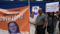 El Salvador human rights lawyer demands public trial as police haul her before judge