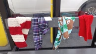 Bus stops, fences 'bombarded' with winter scarves