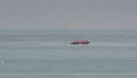 Migrant boat seen trying to make an apparent crossing of English Channel a day after 12 people died