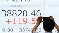 Asian markets are trading mixed as investors wait for key US jobs report