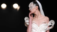 Iris Van Herpen unveils 'living' couture dress of bioluminescent algae in Paris